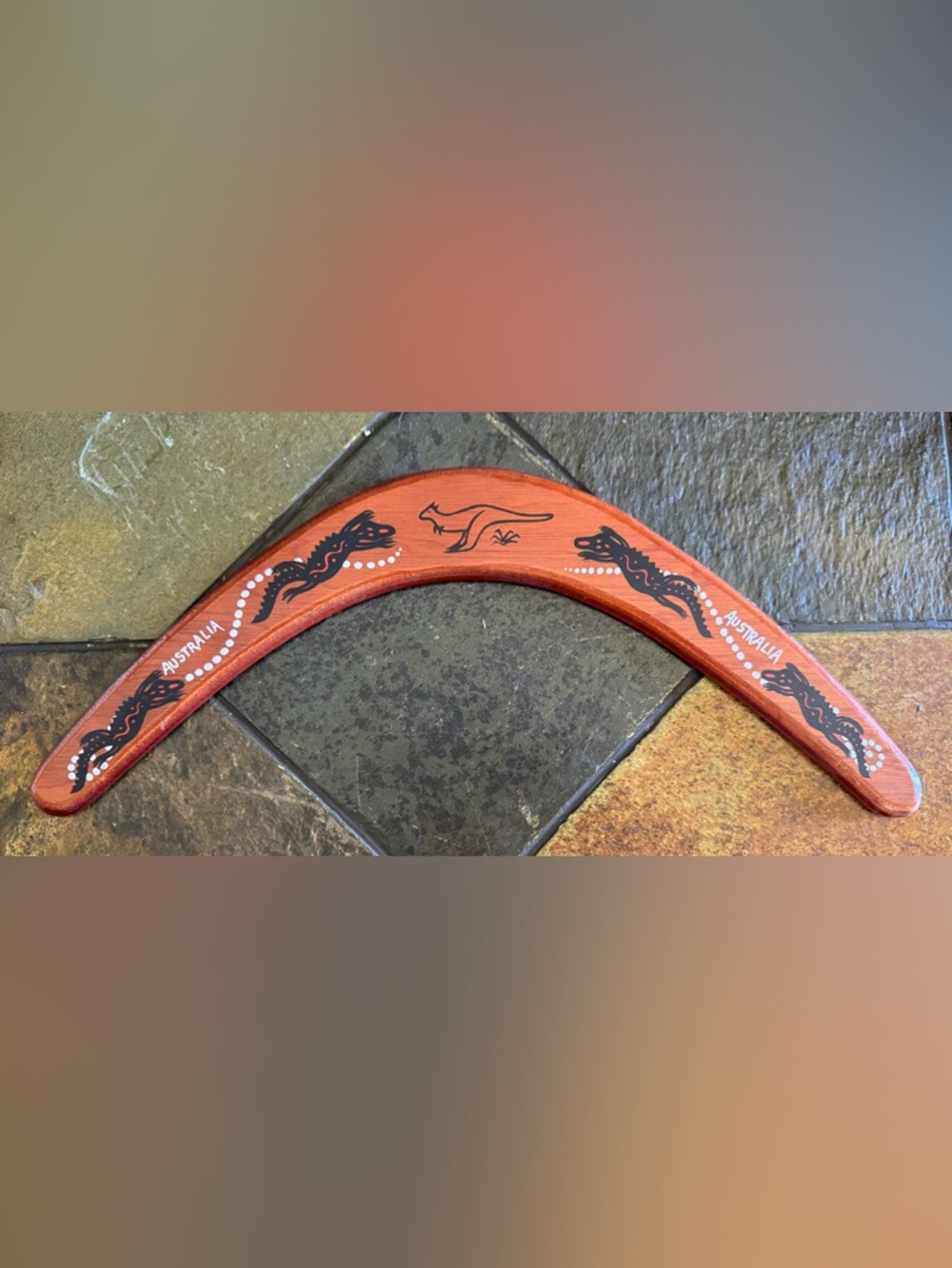Hand-Painted Boomerang with Kangaroo Motif in Terracotta and Black